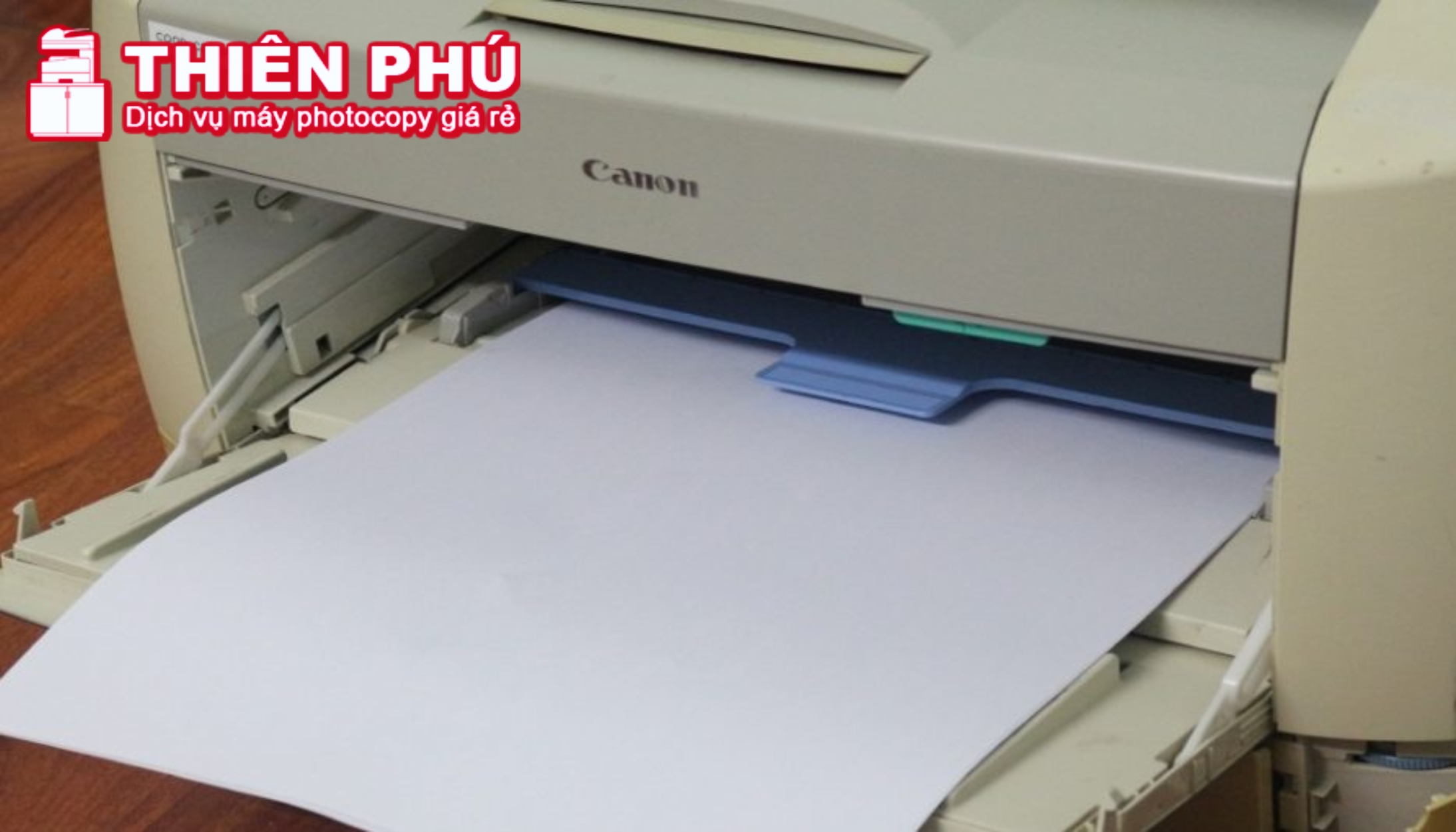 Hướng dẫn cách bỏ giấy vào máy in Canon